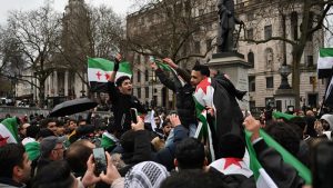 Londra’daki Suriyeliler Esad Rejiminin Düşüşünü Kutladı